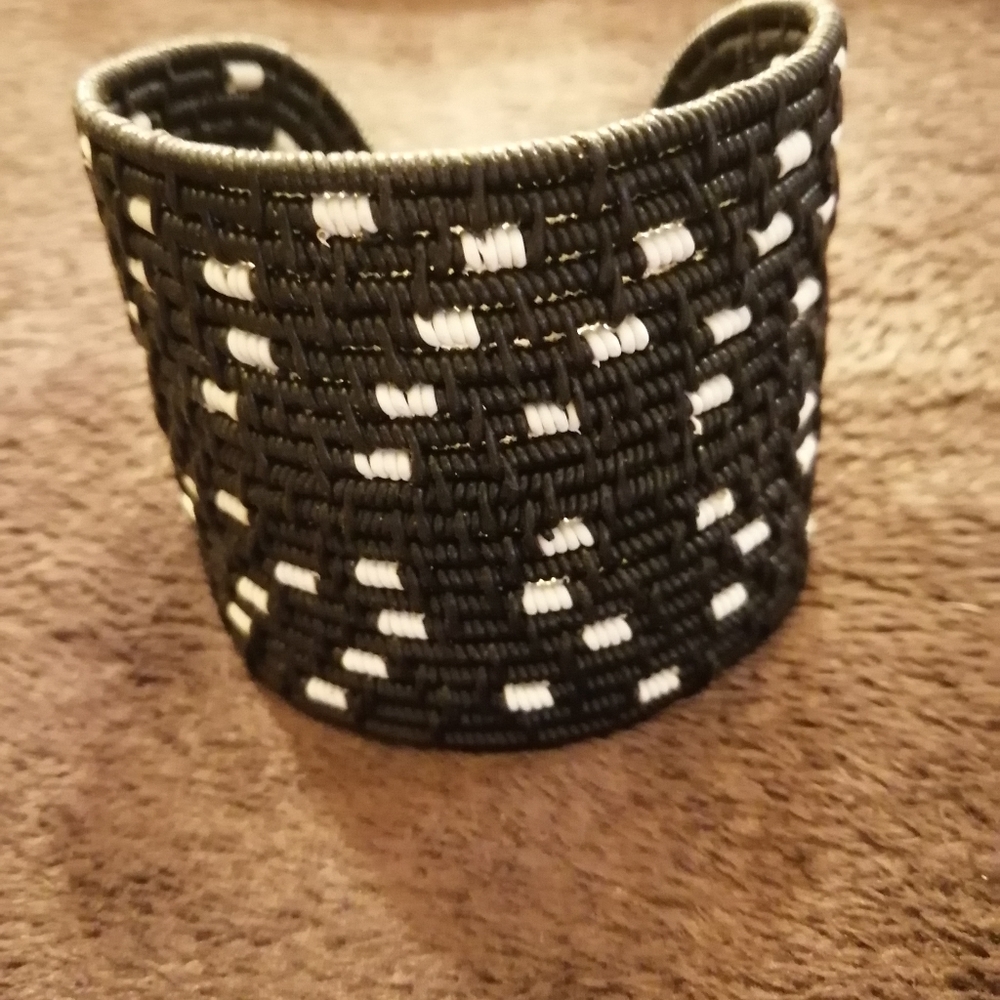 Intricately woven wire cuff